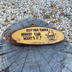 “Keep Your Temper” hand carved sign